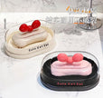 Bow-shaped soap dish with lid