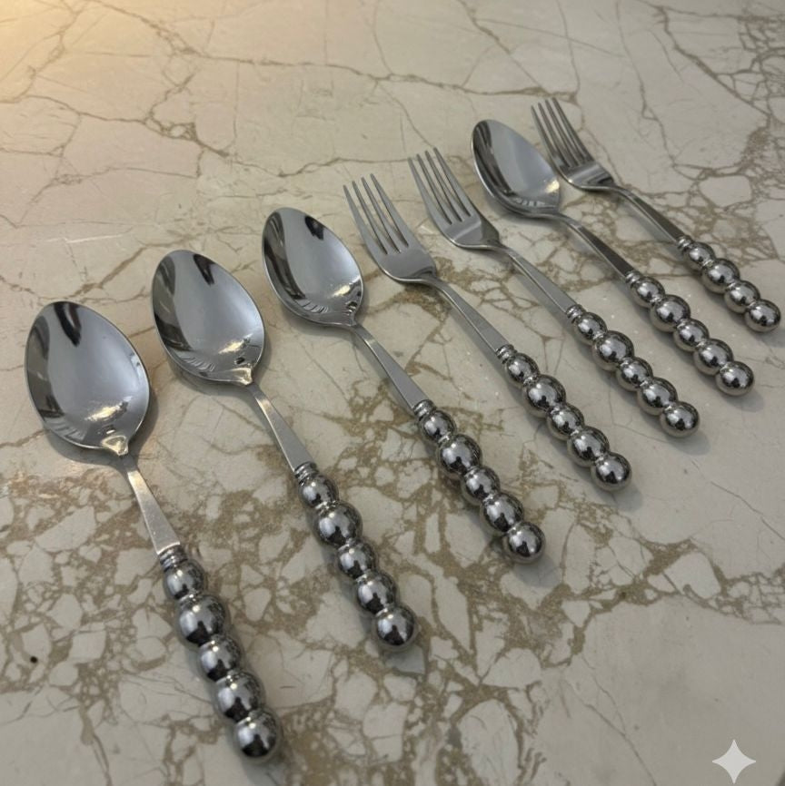 Bubbles 12-piece spoon and fork set with porcelain handles, silver color