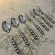 Bubbles 12-piece spoon and fork set with porcelain handles, silver color
