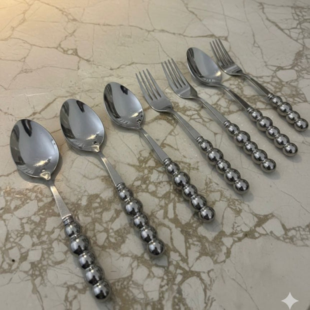 Bubbles 12-piece spoon and fork set with porcelain handles, silver color