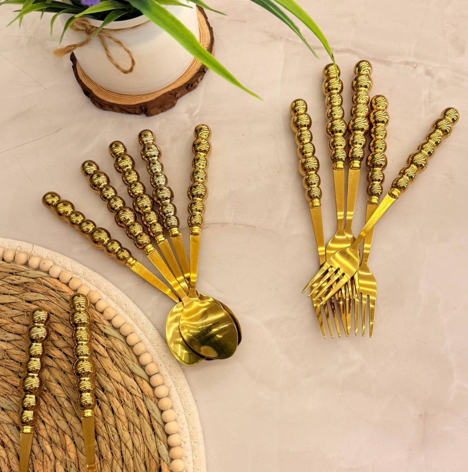 Bubbles 12-piece spoon and fork set with porcelain handles, gold color